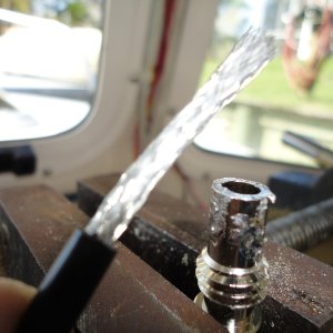 Tined adaptor and stripped outer insullation