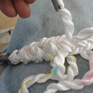 153 tucks before cutting strands