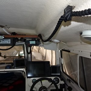 Rope hand rail (and towel hanger) over head.  Velcro, to support interior curtains, between snaps, and allow window opening, with partial window coverage.