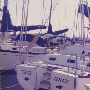 The results of the major surgery--add small swim step, stair, better organized storage, and Radar Arch, and the RIB is winched aboard over the SS bar between the legs of the arch.