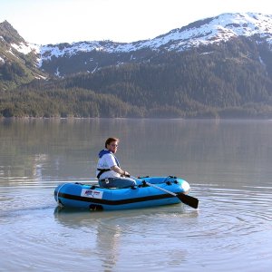 (AnchortownJim) Bill trying out the dinghy, Pigot Bay, PWS, 6/19/04