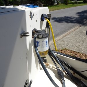 Oversized Razor, power inlet, and wash down pump bib on Starboard side of Splash well.
