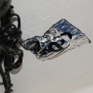 Media 'XM radio antenna adhesive covering/mount for recieving through fiberglass deck, in v-berth' in album 'Microwave and shelf, CO detector'
