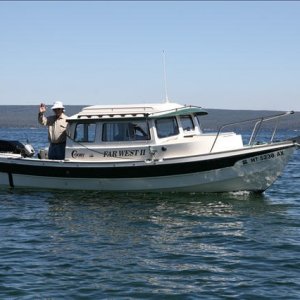 Media 'John and Edna on Yellowstone Lake. Farwest II (the 2nd Farwest II)' in album 'Far West II at YSL Marina, August 2014. Far West has been sold as of October 2014.'