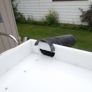 Old drain spout off old cutting board top.