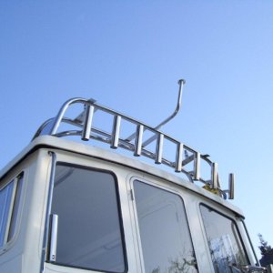 Original radar arch.  But not happy with deck light mounts behind fishing poles, poor design of radar mount and light mast too low.