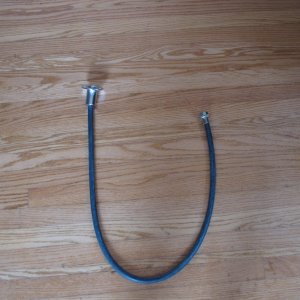 4/27/11 Perko Flag Pole Socket/ Attached rubber hose in order to direct rain water to bilge.