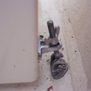This bolt holds barber chair in place along with the 2 barrel bolts  when driving the boat This bolt not used when in dining position