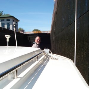 Al crawled out the forward hatch to handle the bow line