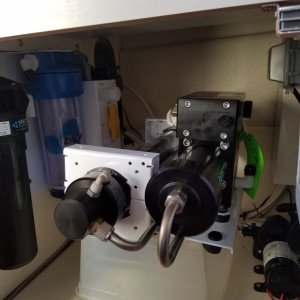 Mocking up where the Clark pump will go. The bottom shelf is about 1/2 inch short of being deep enough, so it has to be raised up.