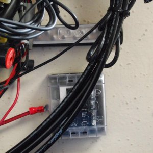 Media 'Sea Angel\'s Secondary AUX 6 ckt DC power block & 10x ground buss 1. The square block is the 12VDC Secondary AUX 12 VDC ATC fuse holder type Power Panel without ground strips and quick connect 'tabs' for the loads. 
The other end of red lead is connected to the 12VDC input connection (stud) of the Main Aux, 12 ckt  fuse panel w/ ground strips.' in album 'Sea Angel\'s Secondary AUX 6 ckt DC power block & 10x ground buss 1. The square block is the 12VDC Secondary AUX 12 VDC ATC fuse holder type Power Panel without ground strips and quick connect 'tabs' for the loads. 
The other end of red lead is connected to the 12VDC input connection (stud) of the Main Aux, 12 ckt  fuse panel w/ ground strips.'