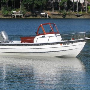 17' custom CC (SEA Craigslist, Oct 2014). Add says it's a '93 open hull converted to CC recently.