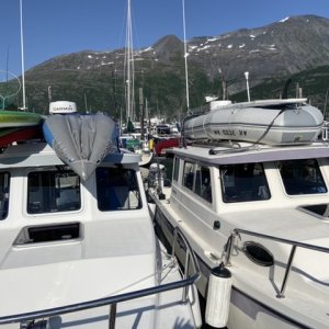 Twin TC25s, squeezing into one slip (Whittier AK harbor, August 2021)