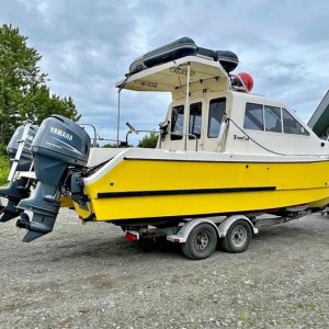 2002 TomCat 24 (for sale in AK Oct 2024 on Anchorage FB marketplace). The distinctive yellow TC, I?ve seen it around occasionally but not for awhile. Same boat on p1 of this album from almost 15 years back.