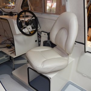 Media 'It also clears the cabin sides.' in album 'The original seats were Sunbrella over flat foam over a piece of plywood.  After a few years, they feel like Sunbrella over plywood.  The widest part of the original seats was at the aluminum hinge right at the bottom, causing my pilot seat to interfere with the throttle when I rotated the seat.'