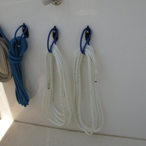 Media 'Sea Angel - 2 additional port Shockcord Line Hangers for a spare 15' and 50' line with their ends whipped.' in album 'Sea Angel Dock Line System with HARKEN Cam-Cleats with color cam caps added. All dock lines are 25'long.'