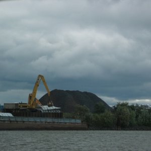 Coal barge being unloaded