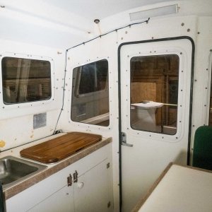 Galley before stripping cabinetry.