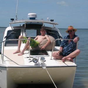 Break time...Preacherman Thaddeus and deckhand Joe lounging on deck.