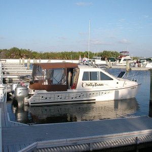 Good shot of our camper canvas. Had 7 people on board overnight while it rained then got cold(40\'s). We\'re so spoiled in Florida