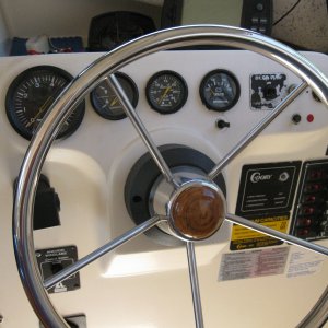 helm with tach, trim indicator, cooling water pressure, voltmeter