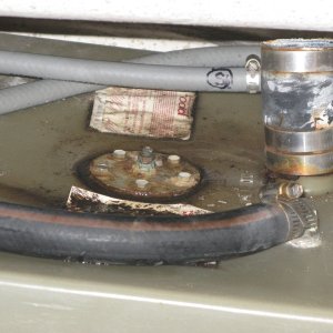 Starboard tank with concaved top...water sits around fuel gauge gasket