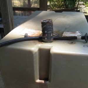 Port tank with pick up tube removed