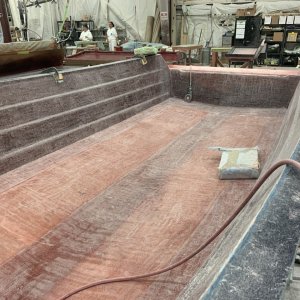 Media 'Bow to Stern Look' in album 'This is the 23 Venture Hull being laid up in our lamination shop.'