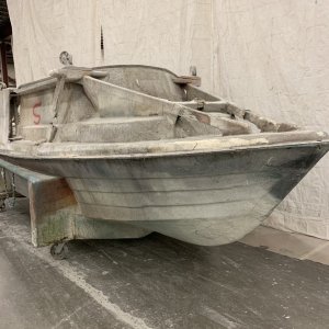 When the two parts are glassed together they are reassembled as one piece in the hull and deck molds together.