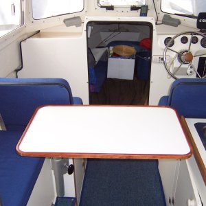 Table can also be turned in this position allowig some use from forward seats and bench seat at the same time. It is possible to crawl under it.