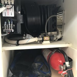Mermaid Marine air conditioner and fire extinguisher under passenger seat