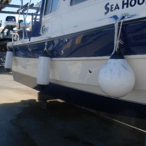 "Docked" fender configuration.  Mid fender clipped to bow eye through cockpit.