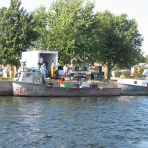 Commercial fishermen unloading a days catch.