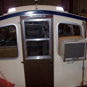 rear opening window with screen, safety glass,
$50 at mobile home supply