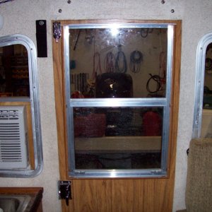 AC install. Vertical sliding window with screen and safetyglass from a mobile home supply only $50