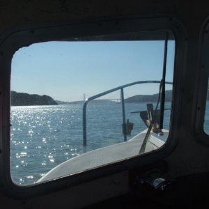 The Golden Gate Bridge on the horizon from inside the Sun Runner