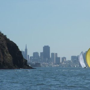 A part of Angel Island on your left and the San Francisco City front in the distance