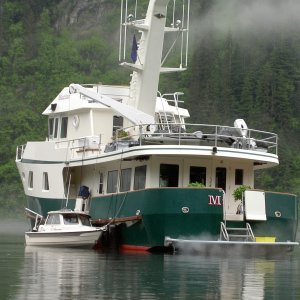 yacht maximo in red bluff bay with its mokai and a c-dory tender