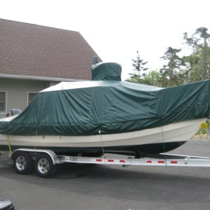 Media 'Made by Angola Canvas. Covers Radar, GPS, and outboards. Works great in high winds, but forgot to tell them about the swim platform so there is some fitting problem there.' in album 'IMG 0352'