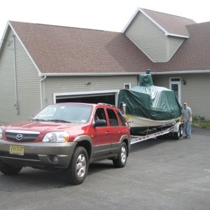Media 'My Mazda Tribute, which is also a Ford Escape pulls the boat with ease. I have the V6 3.0L, AWD and towing package. I also make sure to change the fluids according to heavy use plan.' in album 'IMG 0352'