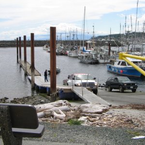 Media 'The ramp is well protected by the breakwater.  There is a small boat marina and a fuel dock. A supermarket and shopping center is adjacent.  Good food in the Rip Tide Marine Pub.' in album 'Launch ramp at Dicovery Harbor, Campbell River, BC'