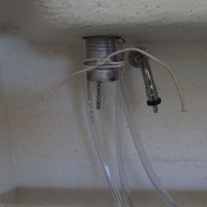 Media 'Vent hoses tied to fill fitting (just to have a place to secure them) (vent is sealed off with expanding plug and thumb screw).' in album 'fill removed, dry core'