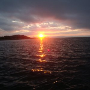 Heavy clouds and a beautiful sunrise east of Comox