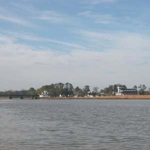 (Sea Angel) Pagan River view of Smithfield Station Marina. The bridge to the left is VA Business Route #10 that passes in front of the marina facility and then along to the famous Smithfield Ham Processing Plant, just north of down town Smithfield, VA..