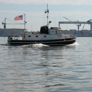 (Sea Angel) Cruising companion, the MAX EFFORT, a 37' home built tug (1986).