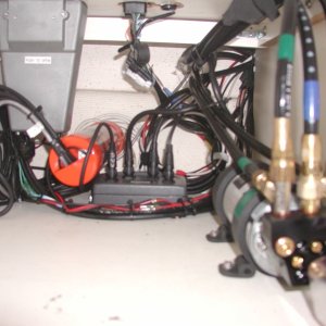 Hydrolic pump and computer under Helm seat.