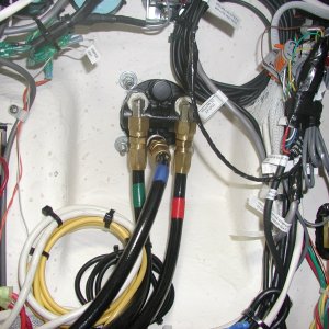 Media 'behind the helm' in album 'Hydrolic pump and computer under Helm seat.'