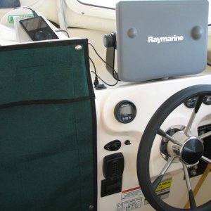 Power switch and volume control for Poly-Planar ME-50 just above trim tab indicator, auxiliary input on top of dash