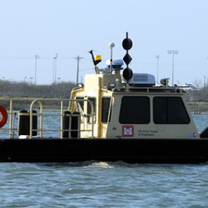 Media 'Small work boat' in album '2 nav aids - one man-made, the other from Nature'