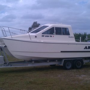 ARGO sitting on the new to me Float On trailer.  I still have a couple smaller things to do to it but it is basically done and trails down the road very well.  Took it the scales twice to get it balanced right and the right weight on the tongue which required me to move both axles back 9".